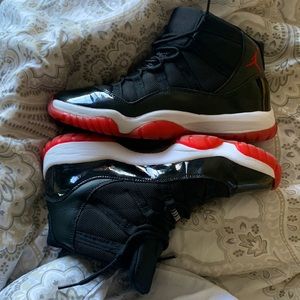 Size men 7/women 9 - Jordan Retro Bred 11 2012